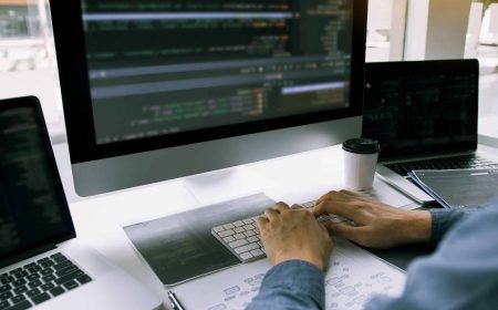Asian man working code program developer computer web development Asian man working code program developer computer web development